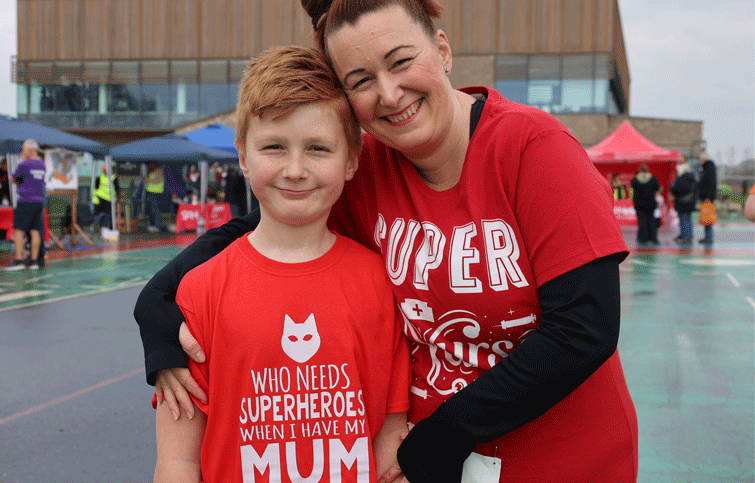 Image: Oliver and Nichole wearing red tshirts took part in St Helena Hospice Hero Run