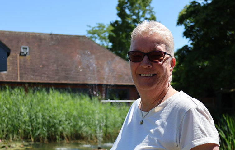 Image: Sue in the garden at St Helena Hospice