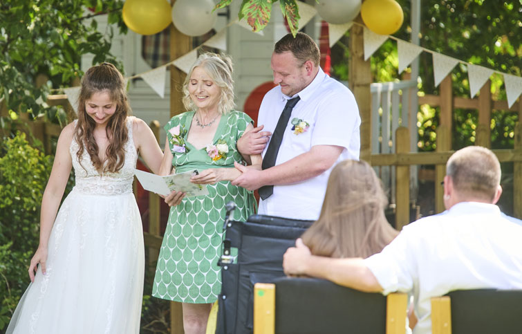 Image: Catherine celebrating her daughter's wedding blessing at St Helena Hospice