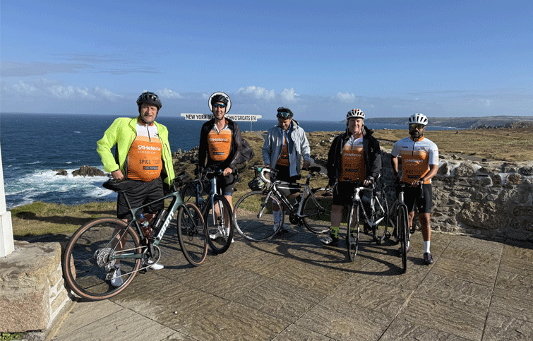 Image: Cyclists at John O'Groats for St Helena Hospice