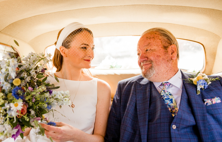Lizzie Hudson and her father on her wedding day