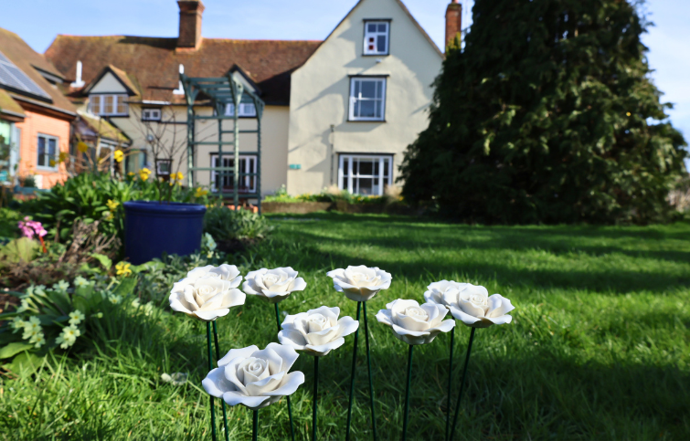 Ceramic Remembrance Rose on display in the hospice garden
