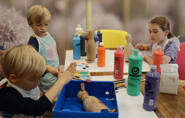 Image: painting wooden ducks