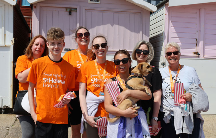 Image: Sue and family walking St Helena Hospice Pier to Pier in memory of Julie