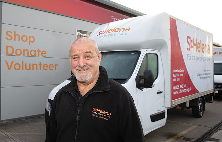 House clearance driver standing outside the van