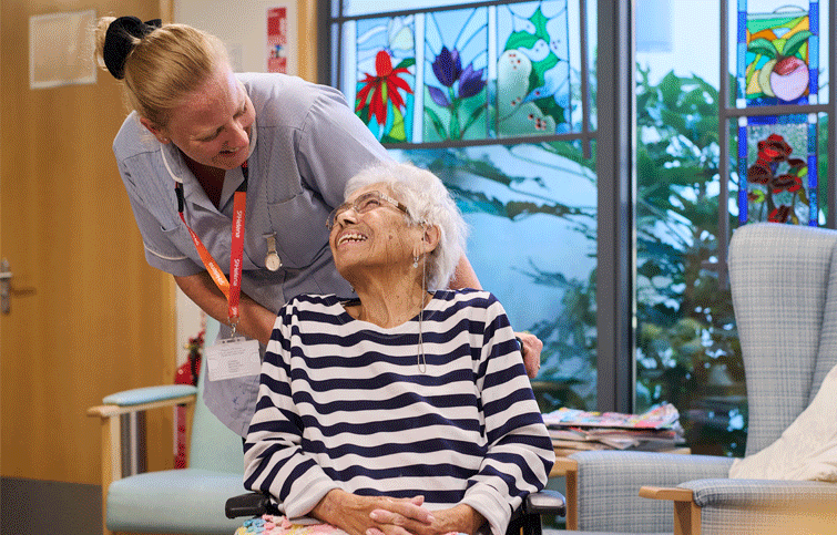 Image: St Helena Hospice clinical support worker with patient