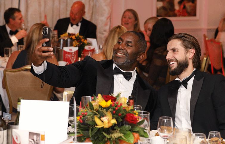 Guests at St Helena Hospice Ruby Ball taking selfie