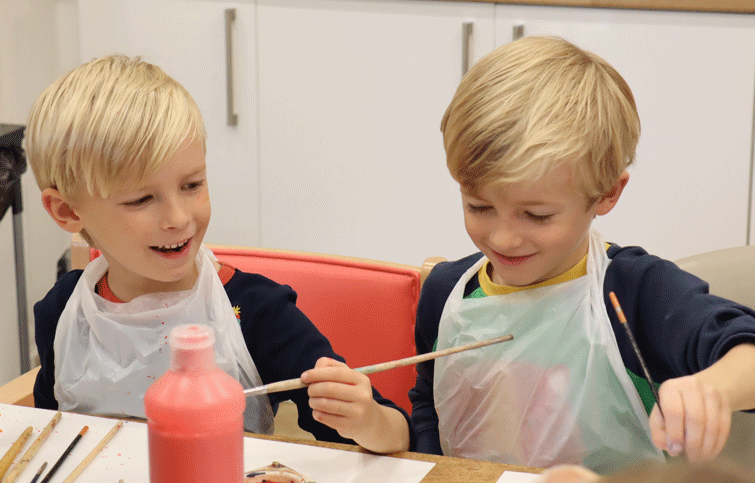 Image: painting wooden ducks