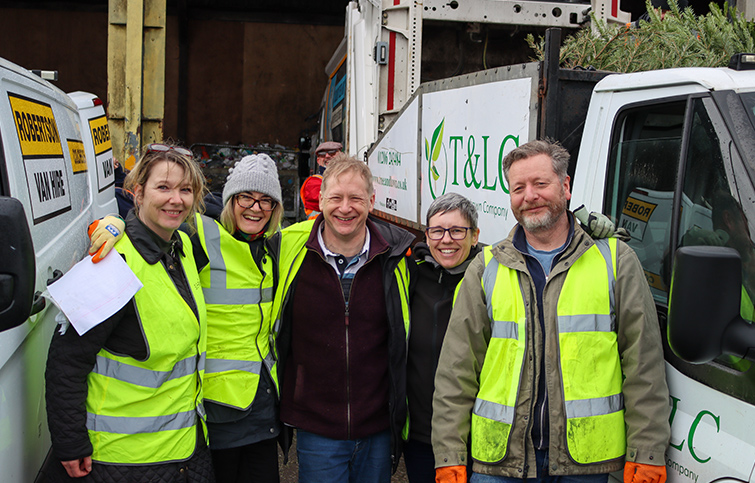 Volunteers pose for a quick photo in-between collections