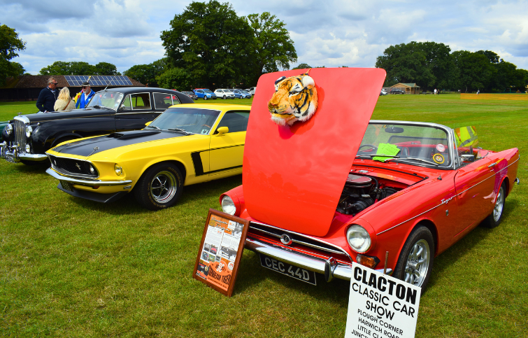 A Triumph, Dodger and Classic Bentley lined up in a row