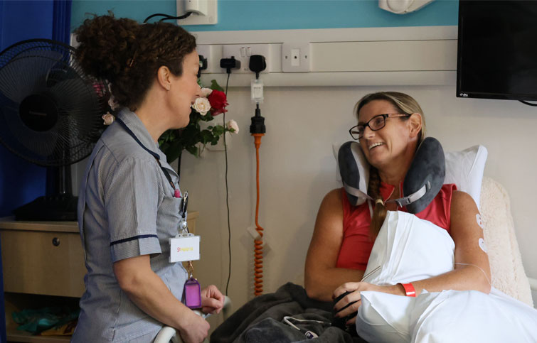 Image: nurse Claire Burton with Julie Warmington at St Helena Hospice