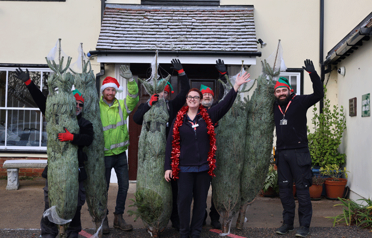 Image:  Hospice staff with George from Fred Smith Christmas Trees
