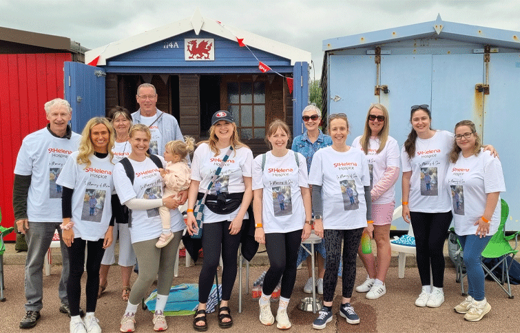 Image: Robin and family at their beach hut supporting St Helena Hospice Pier to Pier