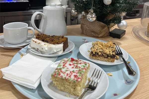 Plate of selection of Christmas cakes at our Books, Brew and Boutique Cafe