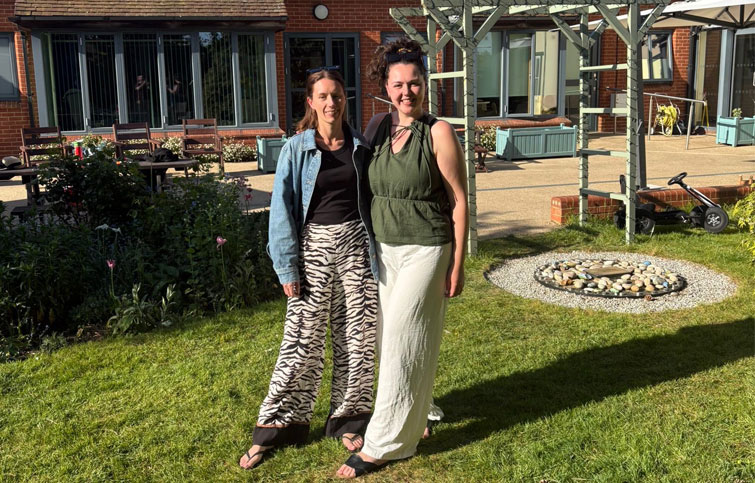 Image: Jess and Lucy in the garden at St Helena Hospice
