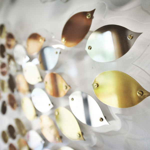 Bronze, Silver and Gold metallic Memory leaves displayed on the wall