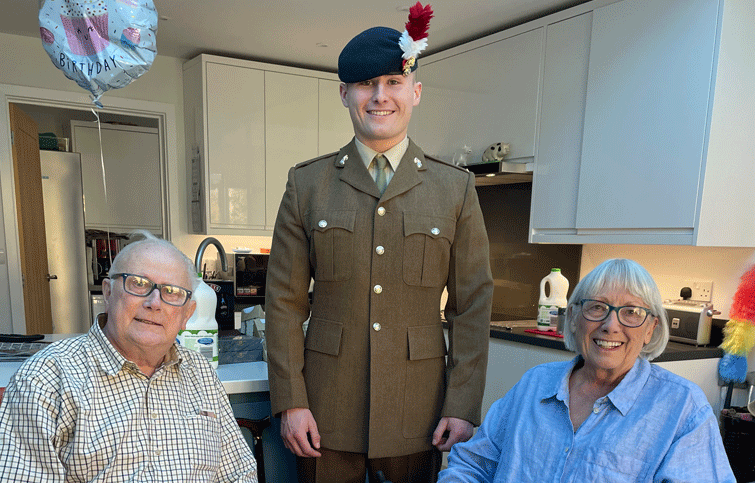 Image: Peter with his grandson and his wife