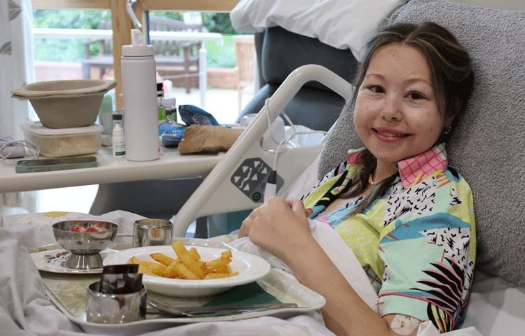 Image: Daisy in the Hospice eating chips