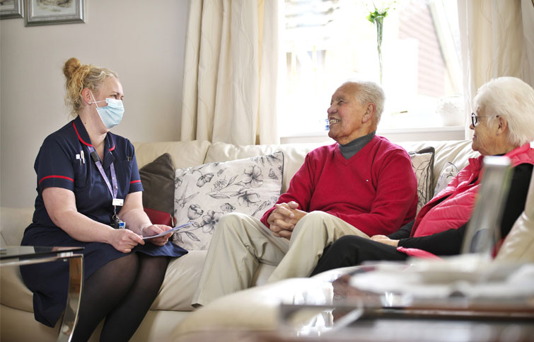 Image: Ricky and Anne with nurse at home