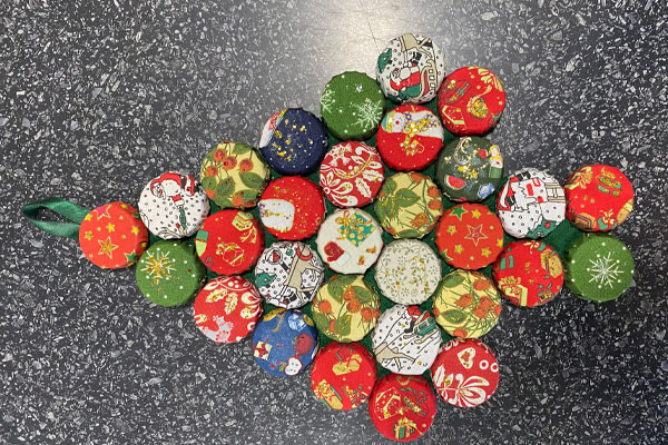 Upcycled Christmas tree decoration made using plastic bottle caps