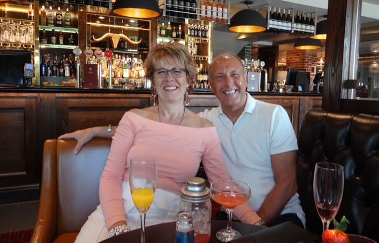 Sharon and Kevin sitting next to each other in a pub