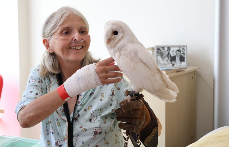 Catherine with owl at St Helena Hospice